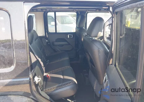 2023 Jeep Wrangler Sahara from USA, damaged, VIN 1C4HJXEN6PW528100